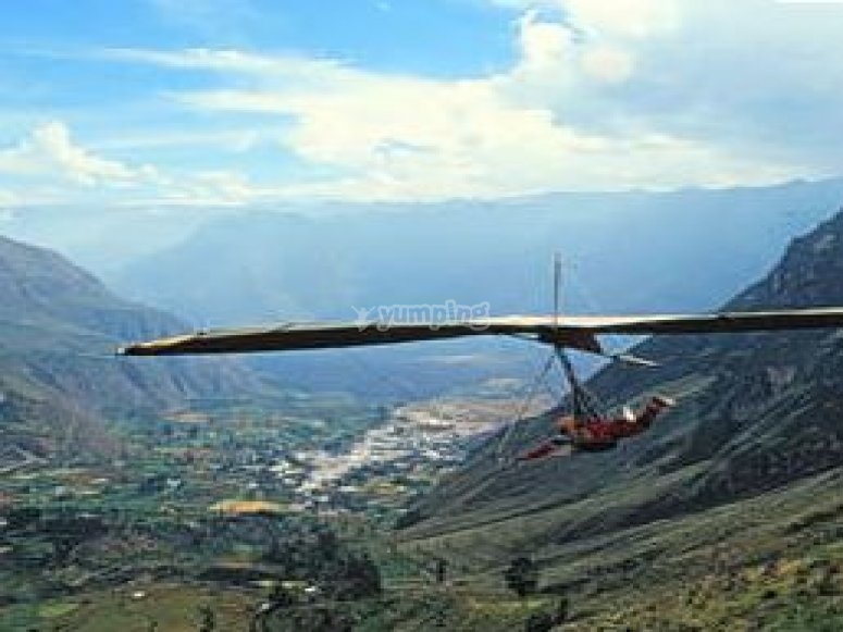 Hang gliding through the hills /tb_Hill hang gliding.jpg
